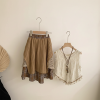 Thumbnail for TinyTrends – Boho chic e carino – Top all’uncinetto con gonna a quadri