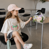 SunnyKids – Comoda e carina – Maglietta oversize con stampa cartoon