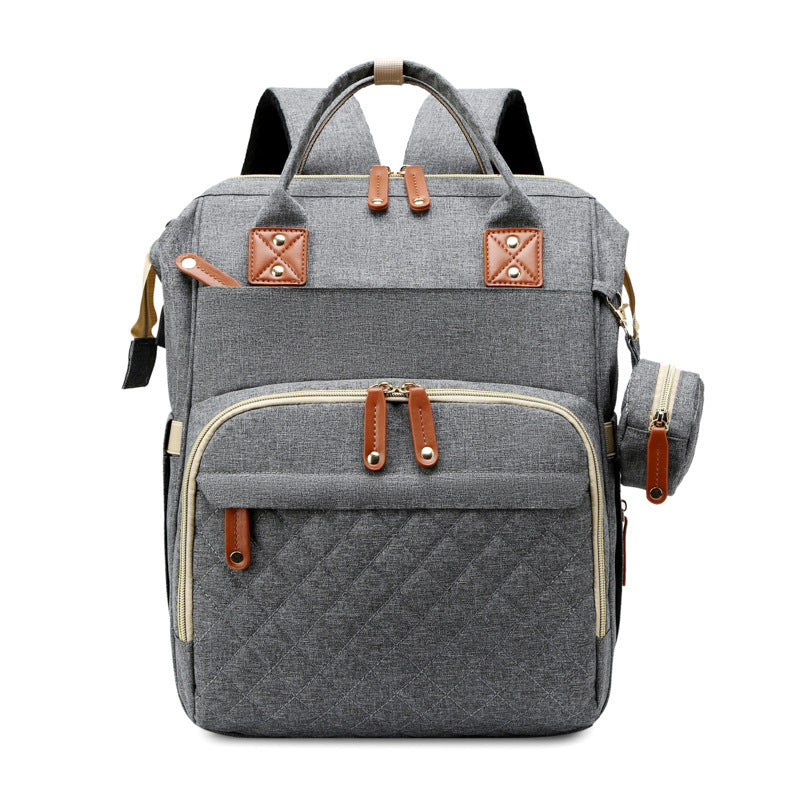 TravelNest – Sempre un posto dove riposare – Borsa per pannolini 2 in 1 con lettino per bambini