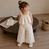 TinyLuxe – Top in pizzo e pantaloni a gamba larga della collezione Zomerset